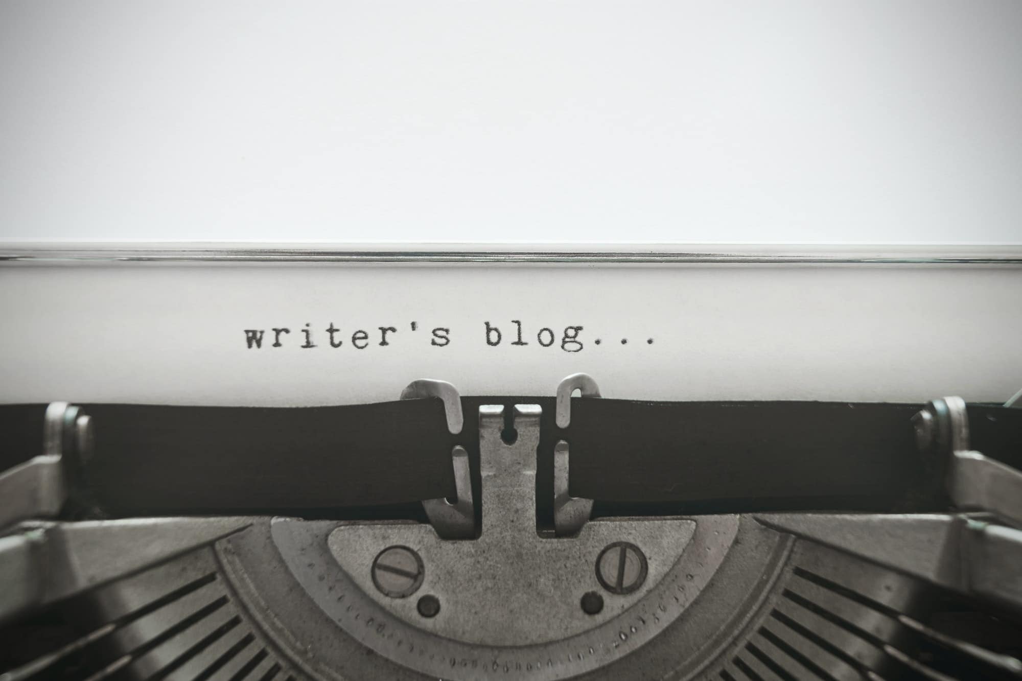 Words "writer's blog" written with old typewriter